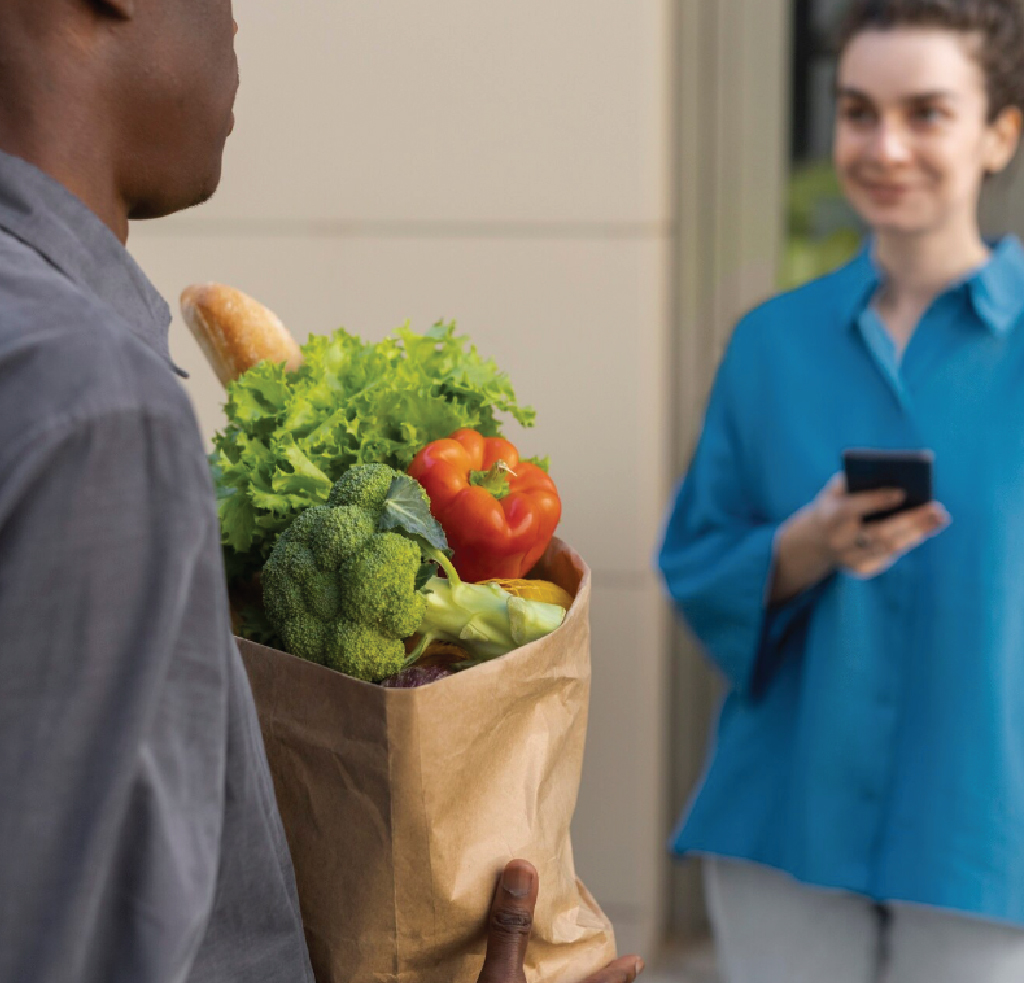 Caregiver reviewing a grocery list with a client